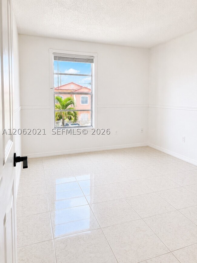 Building Photo - 6095 W 18th Ave