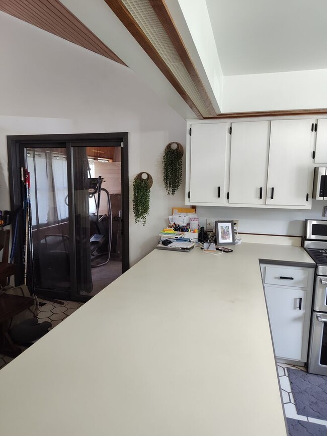 Building Photo - Three bedroom, two bathroom house with private beach access to White Bear Lake.