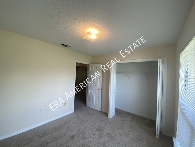 Building Photo - 7468 Woodmont Rd