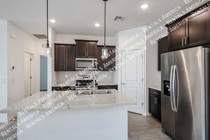 Building Photo - 40322 W Hillman Dr