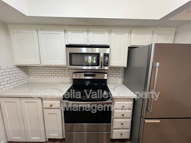 Building Photo - 1655 E Palm Canyon Dr