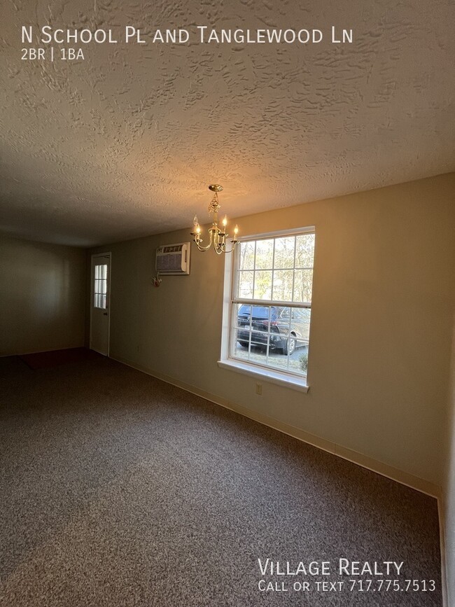 Building Photo - No Steps! Roomy 2-Bed with A/C & Off-Stree...