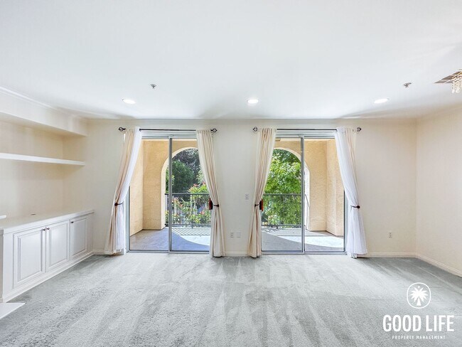Building Photo - OC: Spacious 2BD/2.5BA Condo in Irvine with Resort-Style Amenities, Private Balcony & In-Unit Lau...