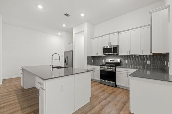 Building Photo - Room to Live, Play, and Grow in Booming Ro...
