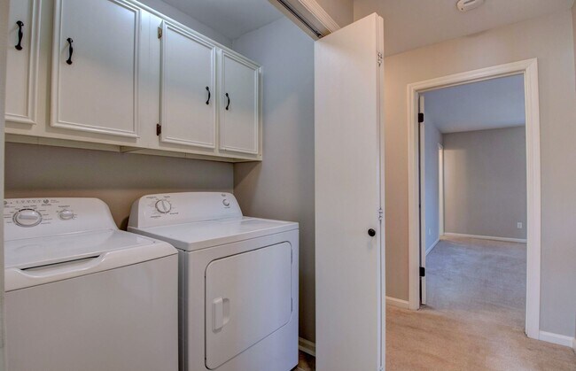 Building Photo - Welcome Home: Charming Brick Beauty with Covered Porch.