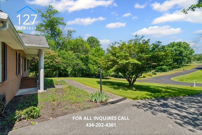 Building Photo - Spacious 4-Bedroom Home with Dual Kitchens...