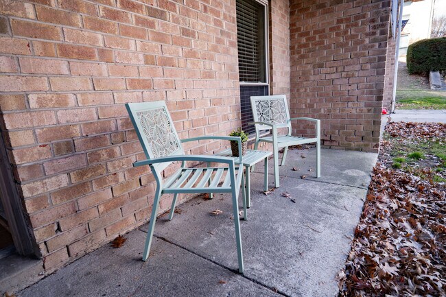 Woodmere Studio Patio - Woodmere Apartments