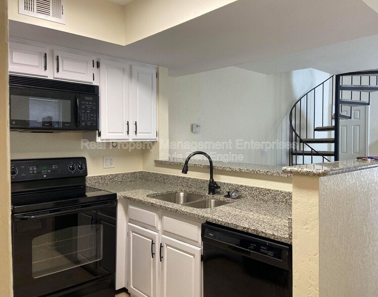 Building Photo - 11530 N May Ave