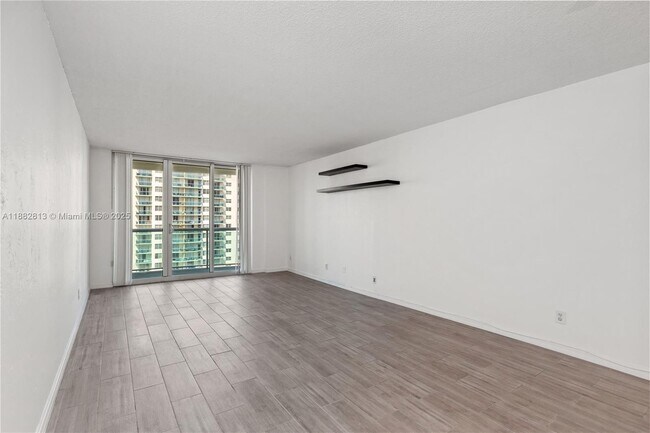 Building Photo - 19380 Collins Ave