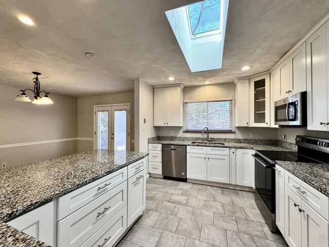 Building Photo - Available NOW! Lakefront 4 Bedroom/2 Bath Home, Pet-Friendly, Fenced Yard, Great School Zones!