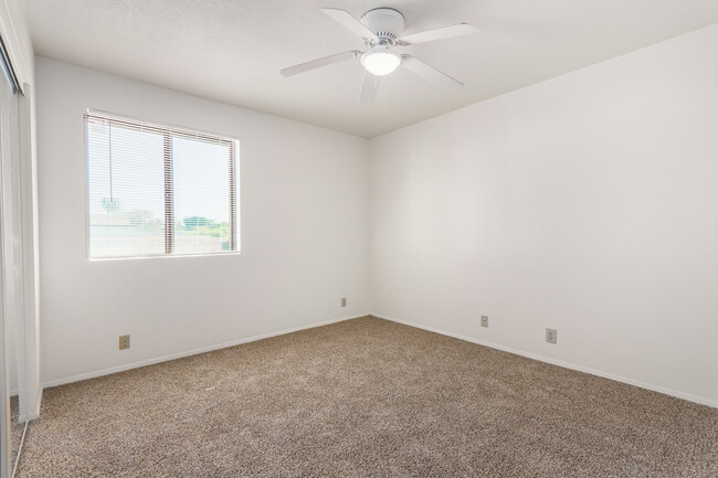 Downstairs bedroom w/ceiling fan - 3748 W Carol Ann Way