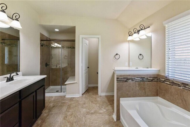 Building Photo - One-and-a-half story, 4 bedroom home - Available early June!