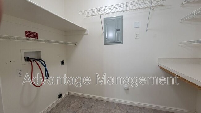 Building Photo - 8083 N Ridge Loop E