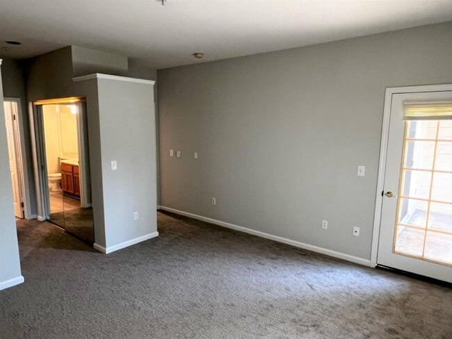 Building Photo - Spacious 2BR/2BA Redwood Shores Condo with Balcony, Natural Light & Garage Parking