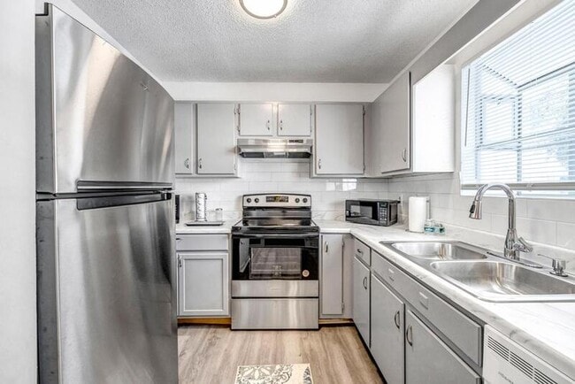 Building Photo - 111 E 1st St