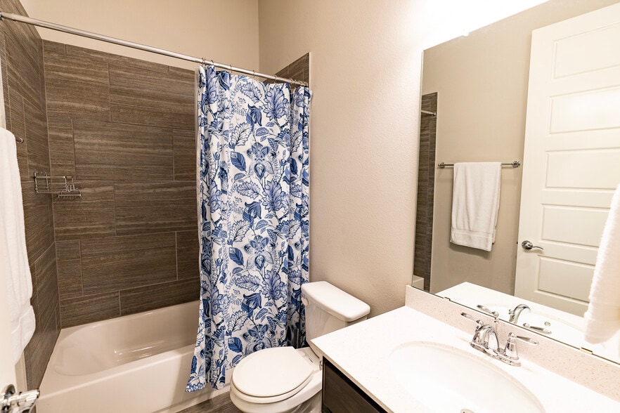 Main-floor bathroom with linen closet - 1711 Arcilla St