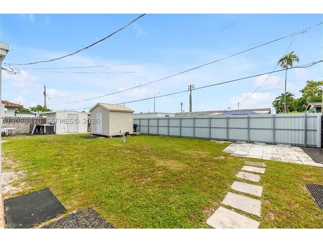 Building Photo - 6049 W 14th Ln