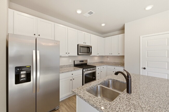 Building Photo - Beautiful Corner Lot, 3 Bedroom, 2.5 Bath with privacy fences and huge backyard!