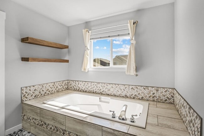 Building Photo - Exquisite 4 Bed, 2.5 Bath Redmond Retreat: Endless Backyard Amenities, Farmhouse Upgrades, and Tr...