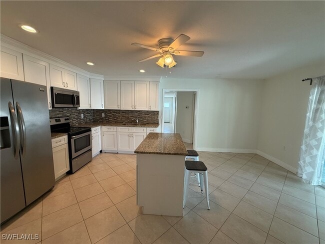 Building Photo - 6677 Fiesta Way