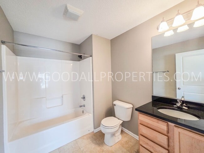 Building Photo - West Des Moines Townhome with Garden Space, Flex Room & Waukee Schools