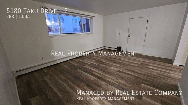 Building Photo - Two Bedroom One Bath Apartment Four Minute...