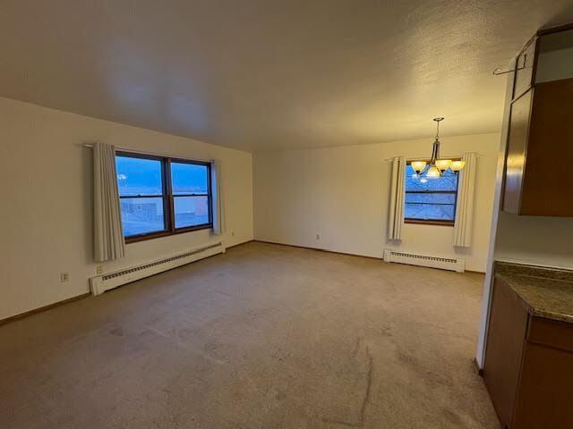 Livingroom with big south and east facing windows - 1022 Arkwright St N