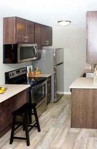 Dark Cabinetry - 410 Apartments