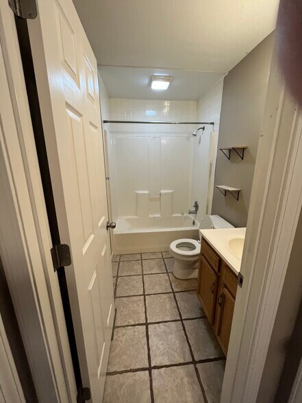 Full bathroom with tub - 114 N Third St