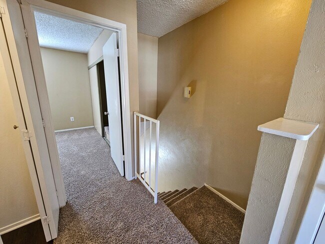 Building Photo - Stunning two-level, two-bedroom, one-and-a-half-bathroom townhome