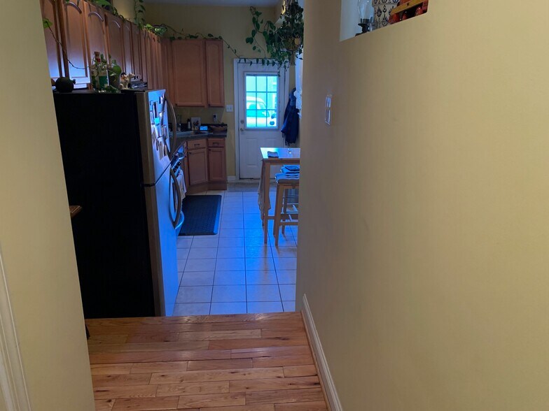 Kitchen Rear Door Access to Parking Pad - 18 S Castle St
