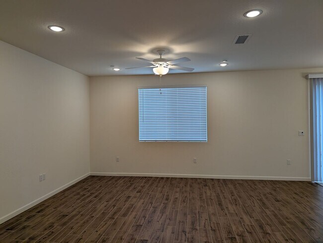 Building Photo - New Wilson home offering modern amenities, solar and a nice floor plan. Bonus room with den or of...