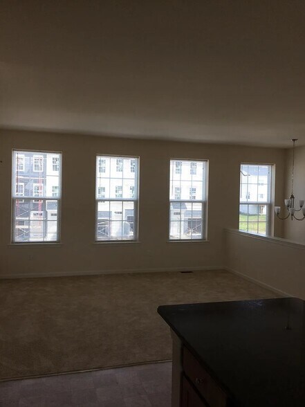 Living room facing entrance - 535 Liam Pl