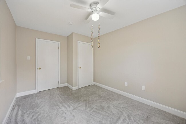 Building Photo - Available Immediately – 4 Bedroom End-Unit...