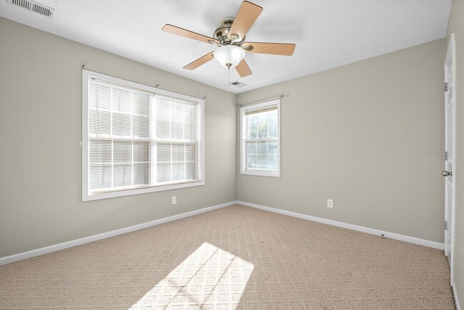 Building Photo - Pet Friendly Three Bedroom with Bonus!
