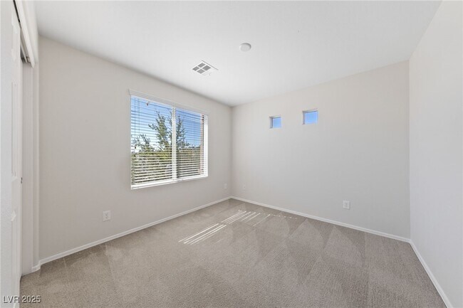 Building Photo - 10247 Blue Water Peak Ave