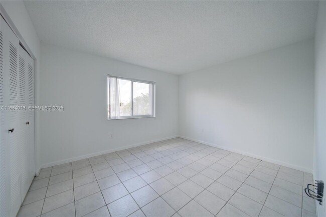 Building Photo - 551 NW 82nd Ave