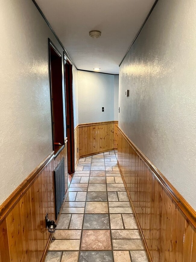 Building Photo - Cozy 3-Bed 2-Bath Cabin-Style Home Nestled...
