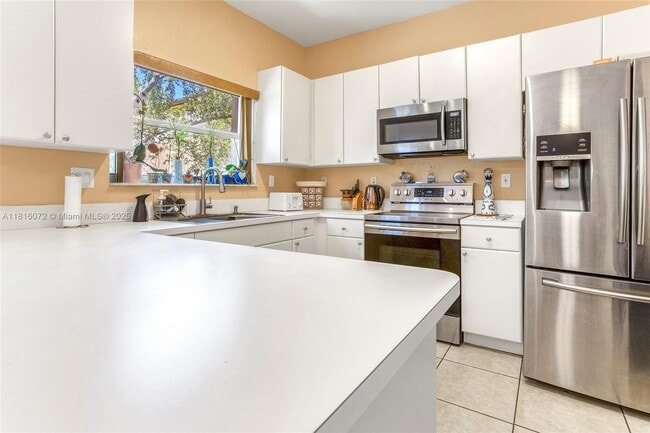 Building Photo - 14070 SW 50th Ct