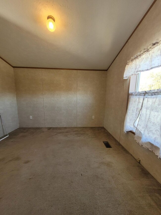 Building Photo - 2 bedroom 1 bathroom Mobile Home Lot rent ...