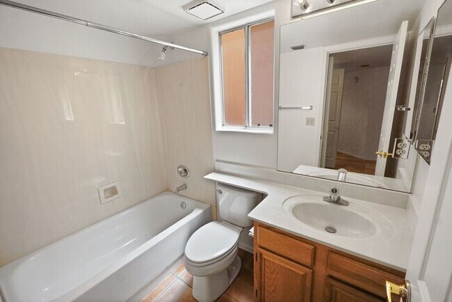 Building Photo - Elegant 4-Bed Home with Balcony & Backyard...
