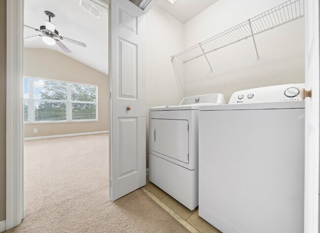 Building Photo - Corner Unit ~ Lake View ~ Maintenance Free...
