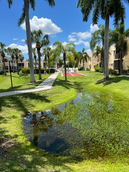 Courtyard with suffelboard court and pool - 12515 McGregor Blvd