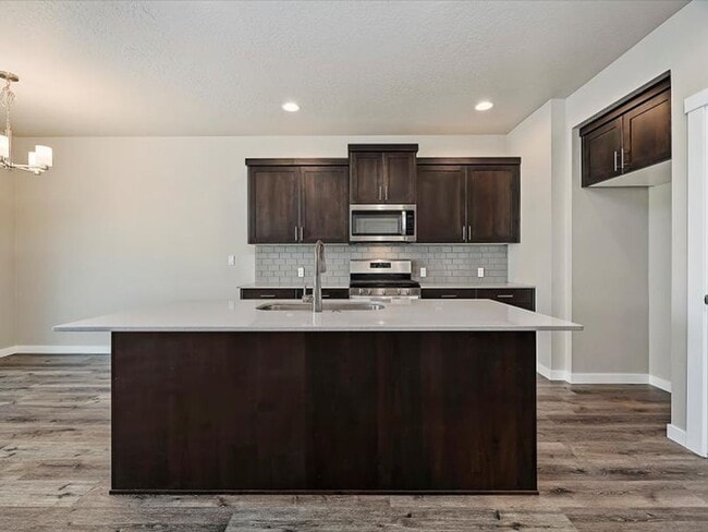 Building Photo - Must See!  Ready to move in! 4 bedroom, 2 bath home available in Verado with landscaping Included!