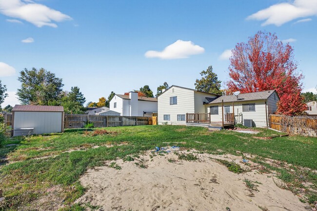Building Photo - For Rent: Charming 4-Bedroom Tri-Level in ...