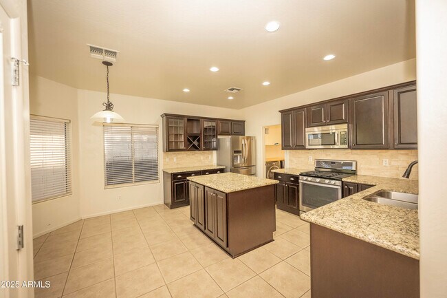 Building Photo - 42920 N Raleigh Ct