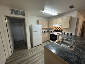 Building Photo - "Charming 1-Bedroom Retreat in Nampa – Spa...