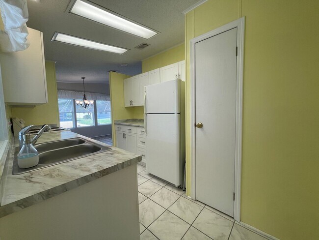 Building Photo - 2 BR 2 BATH Annual Rental in Barefoot Bay Available JUNE 2025