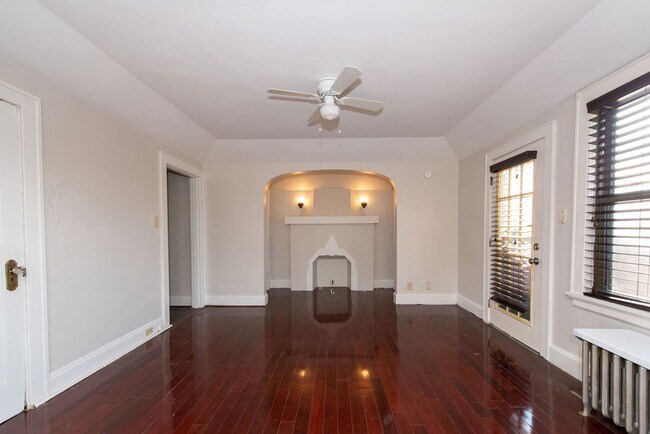 Building Photo - Beautifully updated Tudor style duplex. Up...