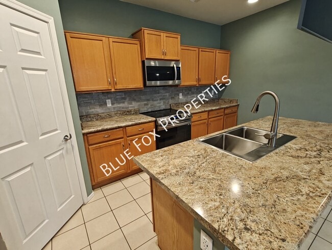 Building Photo - 10947 E Passion Flower Ln